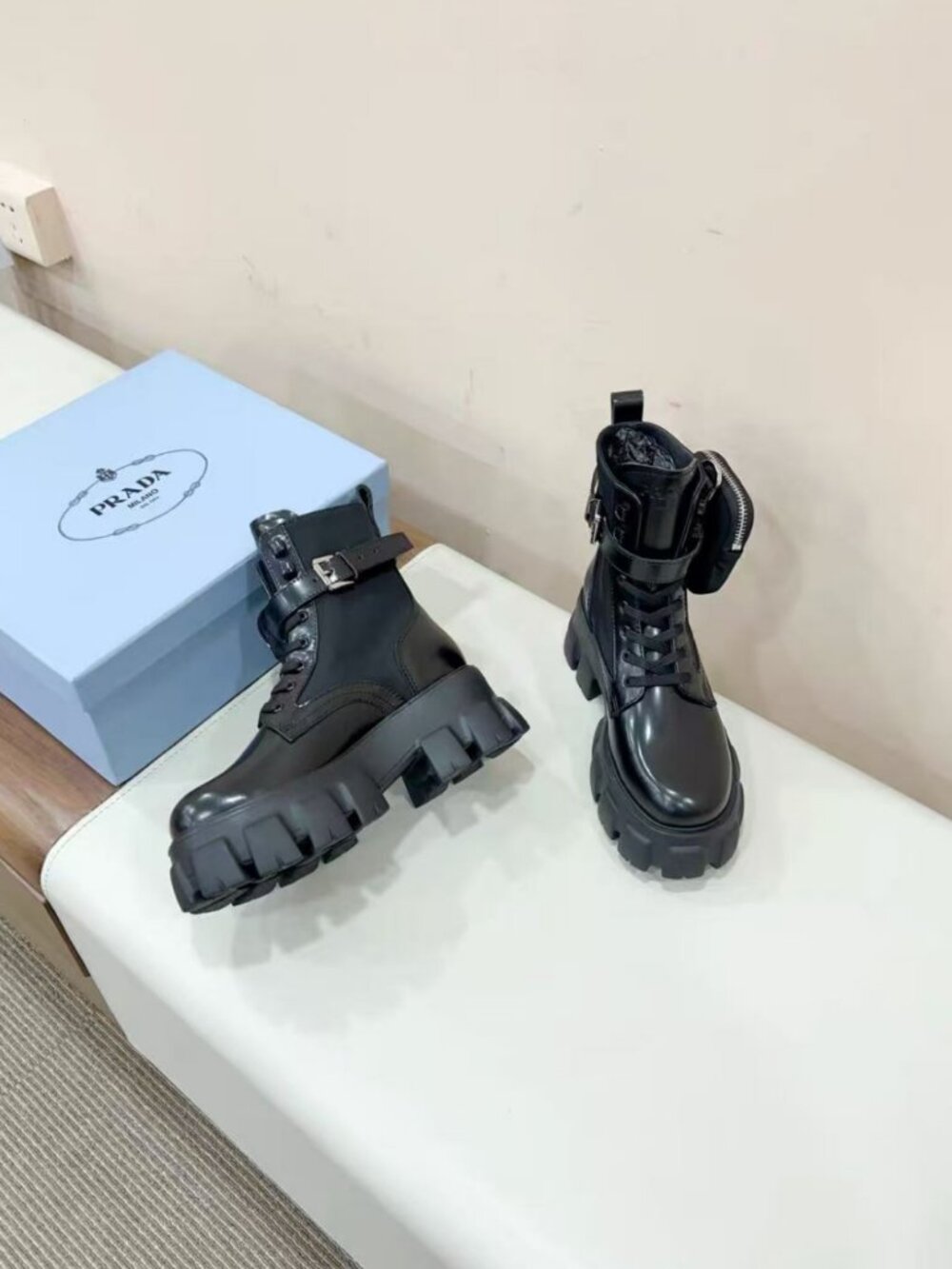 Prada Black Buckle Strap Lug‑Sole Boots With Zip Mini Pouch